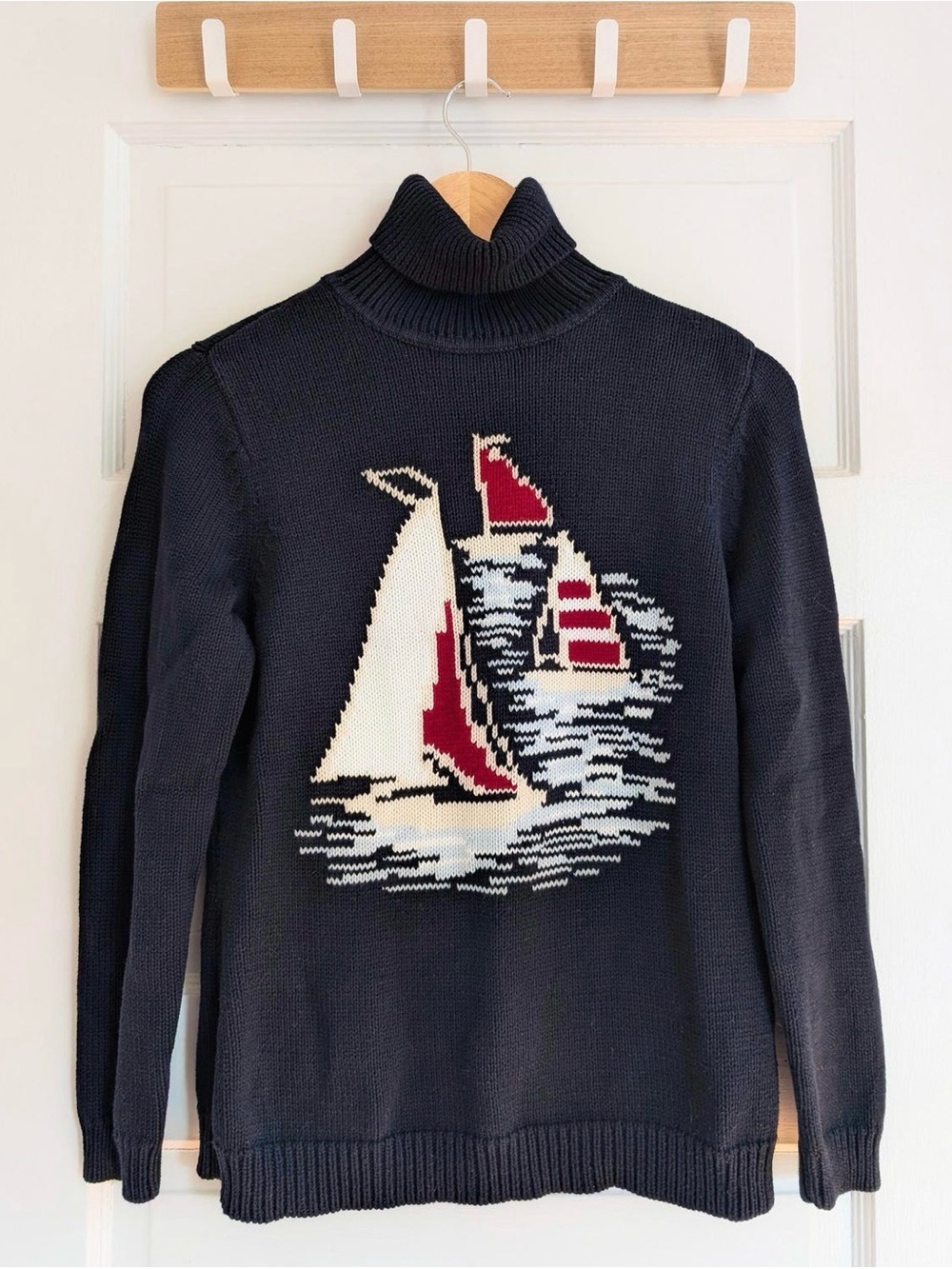 Intarsia sailboat sweater. On trend design in a gorgeous navy. Made in the UK